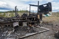 A burned out trailer by the side of the road Royalty Free Stock Photo