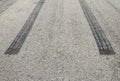 Burned rubber tire track on an asphalt road Royalty Free Stock Photo