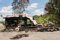 Burned ruins of wooden frame home