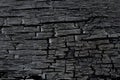 Burned wood texture background. Black burnt wood surface Royalty Free Stock Photo