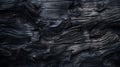 Burned wood texture background, charred black timber. Abstract pattern of dark burnt scorched tree close-up. Concept of charcoal, Royalty Free Stock Photo