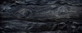 Burned wood texture background, wide banner of charred black timber. Abstract pattern of dark scorched tree. Concept of charcoal, Royalty Free Stock Photo