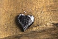 Burned wooden firebrand love heart