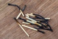 Burned wooden matches sticks on a wooden table background