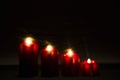 Burning advent candles on the frosted window with 2015 new year'