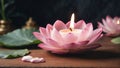 Burning aroma wax candle possesses the intricate shape of a lotus blossom with delicate petals Royalty Free Stock Photo