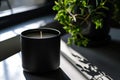 Burning aromatic burning candle in jar. Wax candle with wick in natural style