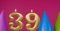 Burning birthday cake candle number 39. Happy Birthday background anniversary celebration concept. Birthday hat in the