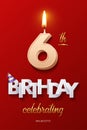 Burning Birthday candle in the form of number 6 figure and Happy Birthday celebrating text with party cane isolated on