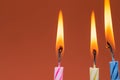 Burning birthday candles close up macro shot Royalty Free Stock Photo