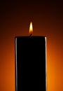 Black candle on dark Royalty Free Stock Photo