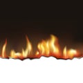 Burning black paper, flame on a dark background Royalty Free Stock Photo