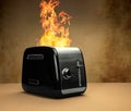 Burning black silver toaster with big burning flames on top with baked ready toast on a brown table with brown structured Royalty Free Stock Photo