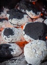 burning briquettes inside the grill Royalty Free Stock Photo