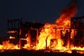 Burning building. Fire. Wirfire. Burning house at night, roof of building in flames and smoke. Royalty Free Stock Photo