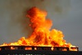Burning building. Fire. Wirfire. Burning house at night, roof of building in flames and smoke. Royalty Free Stock Photo
