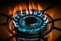 burning burner of a working gas stove. blue fuel. eco