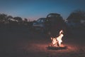 Burning camp fire at dusk in camping site, Botswana, Africa. Summer adventures and exploration in the african National Parks.