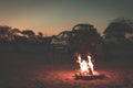 Burning camp fire at dusk in camping site, Botswana, Africa. Summer adventures and exploration in the african National Parks. Sele