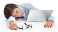 Burning the candle at both ends. An exhausted young man sleeping on top of his laptop. Royalty Free Stock Photo