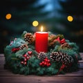 Burning candle and Christmas decoration over snow and wooden background, elegant low-key shot with festive mood Royalty Free Stock Photo