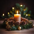 Burning candle and Christmas decoration over snow and wooden background, elegant low-key shot with festive mood Royalty Free Stock Photo