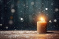 Burning candle, Christmas decoration on wooden background in falling snow and defocused lights background. Copy space Royalty Free Stock Photo