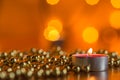 Burning candle and Christmas ornaments Royalty Free Stock Photo