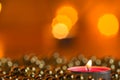 Burning candle and Christmas ornaments Royalty Free Stock Photo