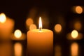Burning candle in dark Royalty Free Stock Photo