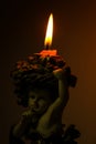 Burning candle in the dark background Royalty Free Stock Photo