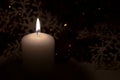 Burning candle on a dark background close-up Royalty Free Stock Photo