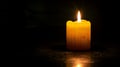 Burning candle on dark background. Day of Remembrance. Witchcraft. Black magic ritual Royalty Free Stock Photo