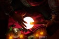 Burning candle above crystal ball Royalty Free Stock Photo