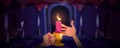 Burning candle in human hands in castle hall Royalty Free Stock Photo