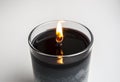 When burning candle let top layer melt through so the wick will last longer .