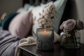 burning candle night light near the bed illustration Generative AI Royalty Free Stock Photo