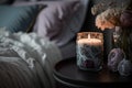 burning candle night light near the bed illustration Generative AI Royalty Free Stock Photo
