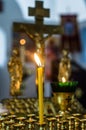 Burning candle in the Russian Orthodox Church. Royalty Free Stock Photo