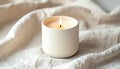 Burning Candle on Soft Linen Background Royalty Free Stock Photo