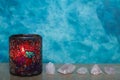 burning candle and stones on a wooden background Royalty Free Stock Photo