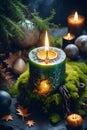 burning candle, symbol of the moon, amulet lying on moss on a dark natural background. pagan Wicca, Slavic traditions.