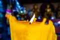 Burning candle in Thai temple Royalty Free Stock Photo