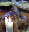 A Burning Candle on a Thanksgiving Table Royalty Free Stock Photo
