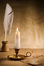 Burning candle in vintage candlestick Royalty Free Stock Photo