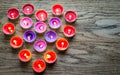 Burning candles arranged in the shape of heart Royalty Free Stock Photo