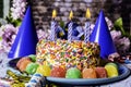 Burning Candles and Birthday Cake Royalty Free Stock Photo