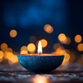 Burning candles in a bowl. Bokeh effect in the background. Diwali, the dipawali Indian festival