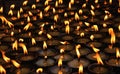 Burning candles at a Buddhist temple Royalty Free Stock Photo