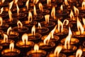 Burning candles in Buddhist temple Royalty Free Stock Photo